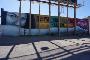 Albuquerque New Mexico street mural of Native American woman with the words Respect Reproductive Freedom