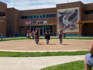 Native American dancers performing at the outdoor rotunda at the Indian Pueblo Cultural Center in Albuquerque New Mexico