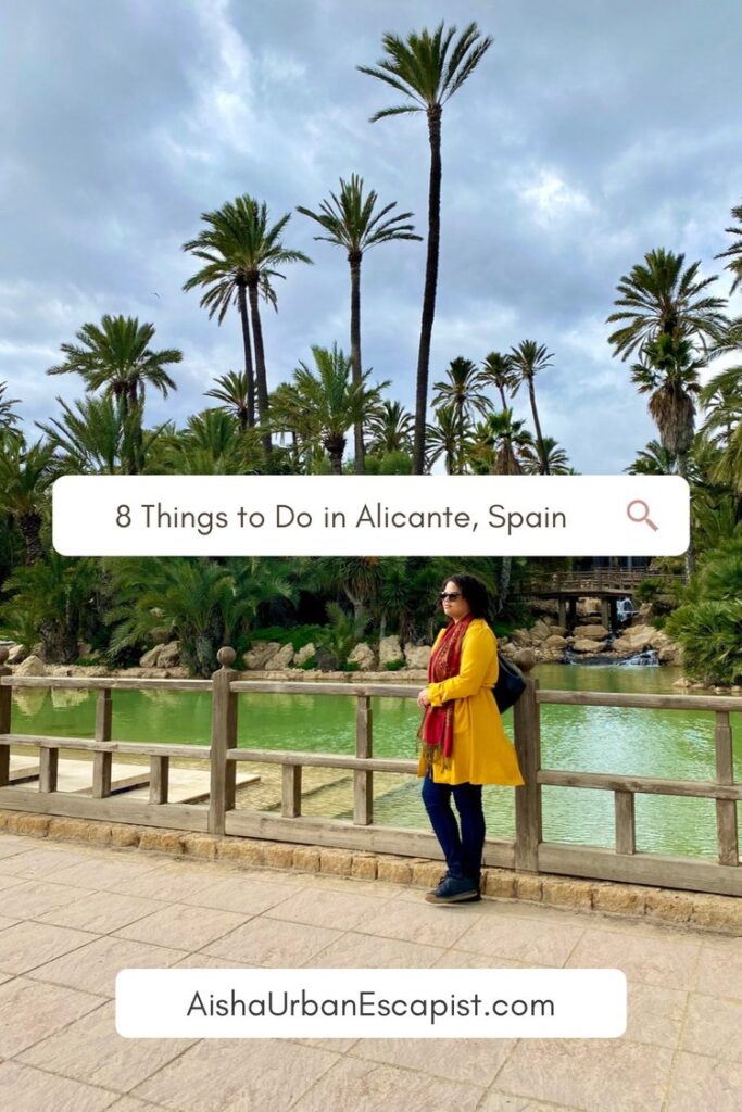 Photo of woman in front of a lake and palm trees with the title 8 things to do in Alicante Spain