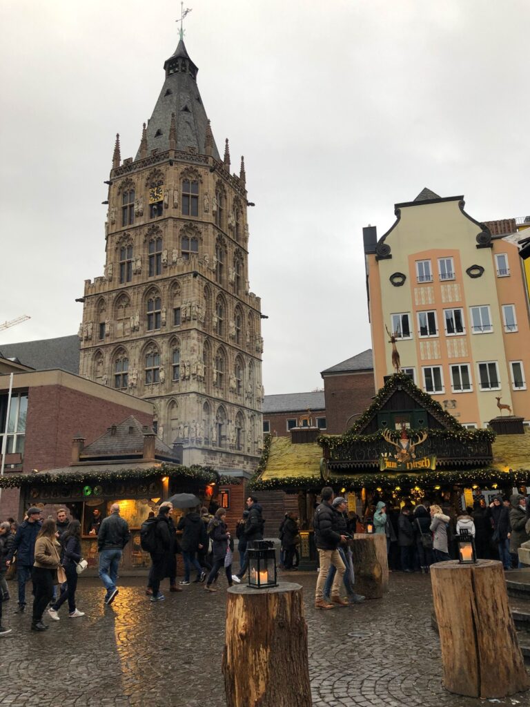 Historic buildings surrounding a Christmas market in Germany