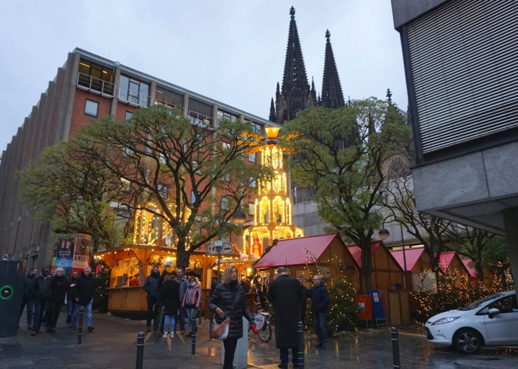 View of a Christmas pyramid at the center of a Christmas market in Cologne, Germany