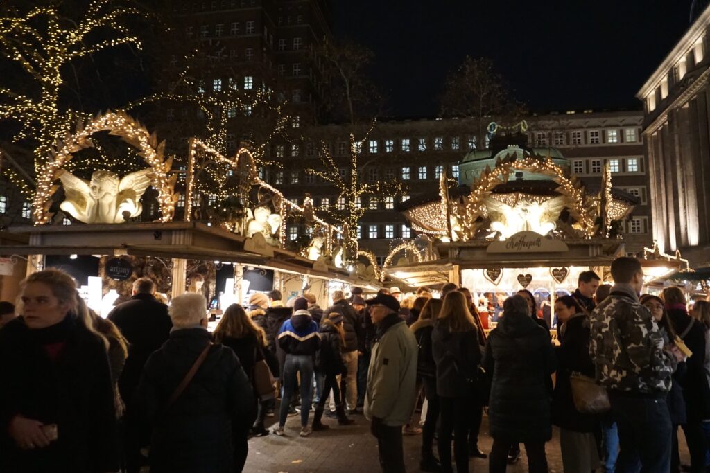 Multiple Christmas market angel-themed stalls in Dusseldorf, Germany