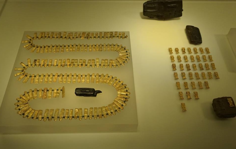 Gold pre-Columbian jewelry artifacts in a Bogotá Colombia museum display
