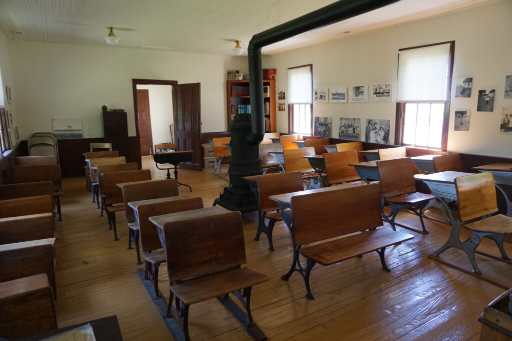 Chairs and desks in a historic one-room schoolhouse in southern Maryland