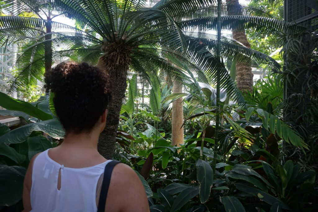 Woman looking away from camera at botanic gardens in Washington DC