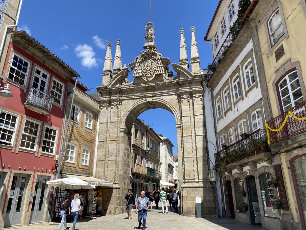 Historic stone arc at the entrance to an old town historic center