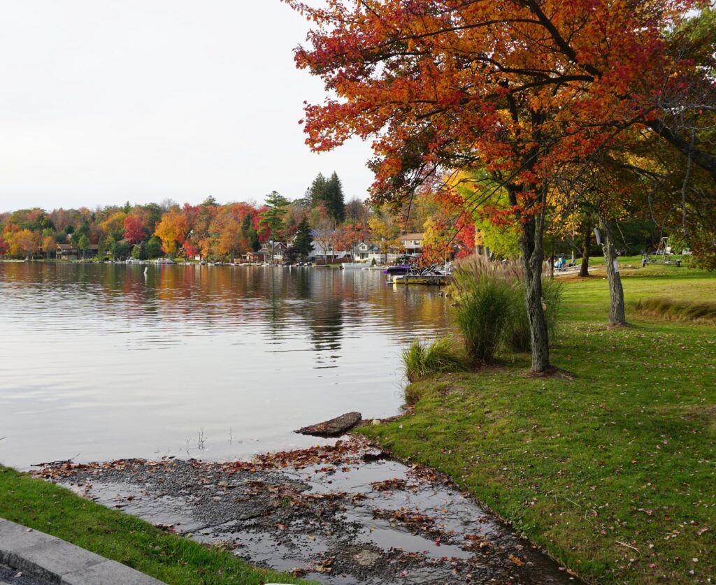 Autumn foliage around a lake during fall in the Poconos