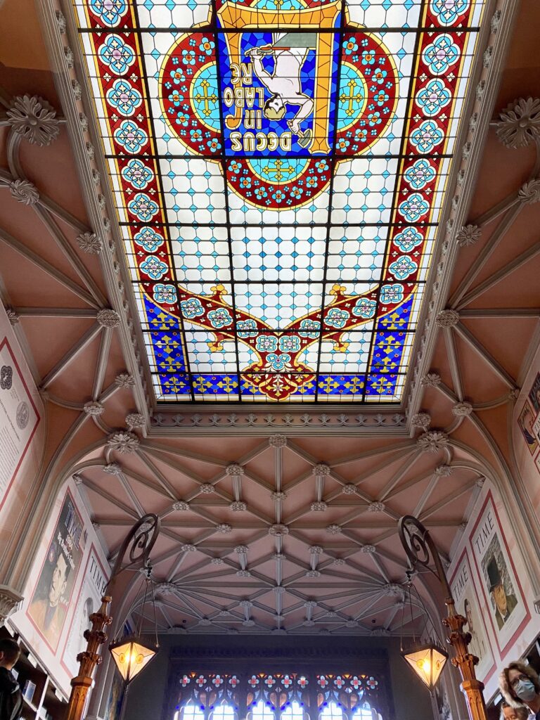 Stained glass and other detail on bookstore ceiling in Porto Portugal