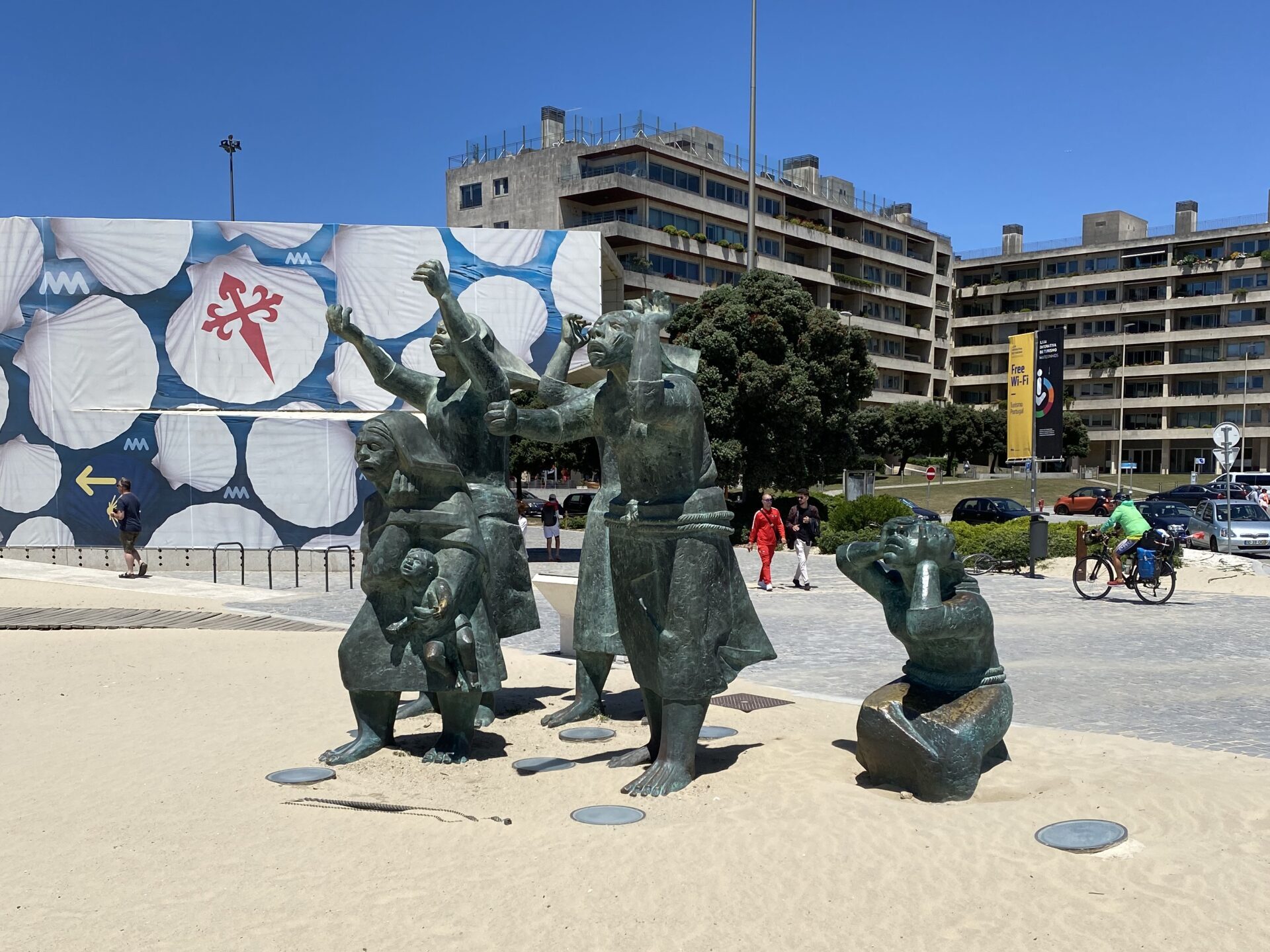 Sculpture of four anguished women on a beach in Porto Portugal