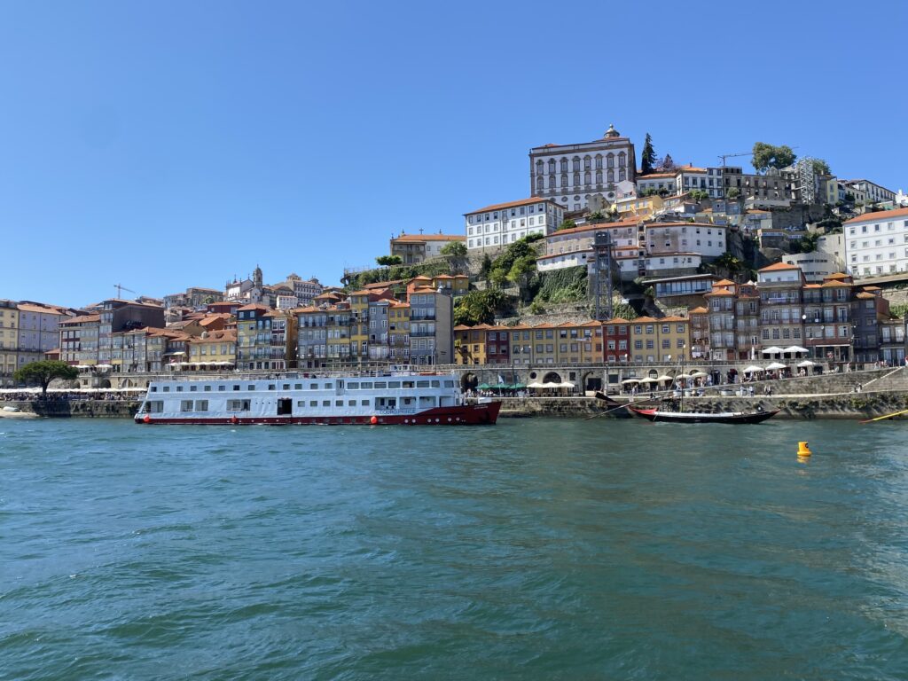 Buildings along the Douro River and boats in the water
