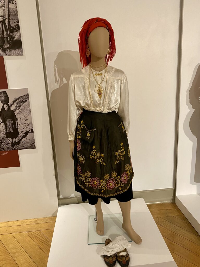 Child mannequin in a museum dressed in northern Portugal traditional blouse and skirt