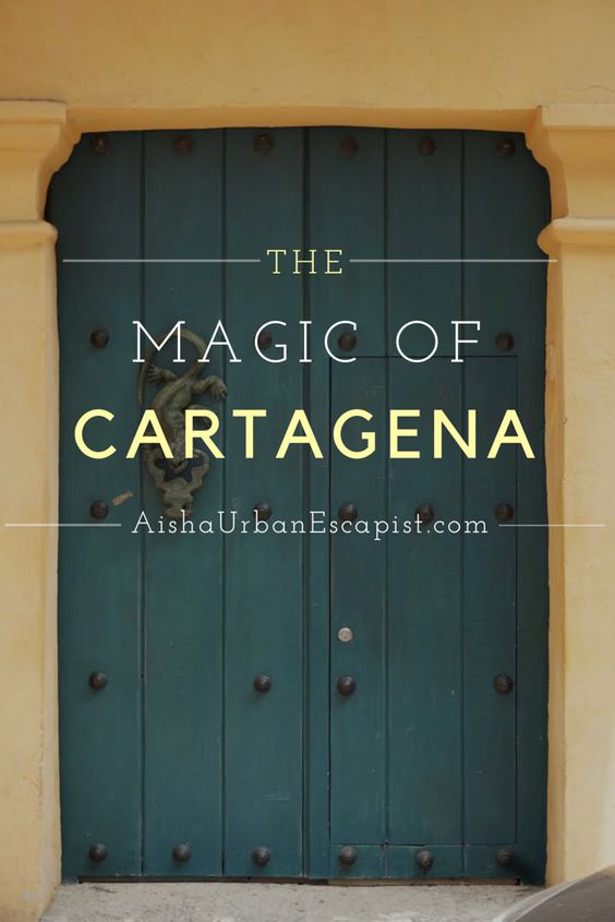 Green Spanish-style double door with  lizard door knocker in Cartagena, Colombia