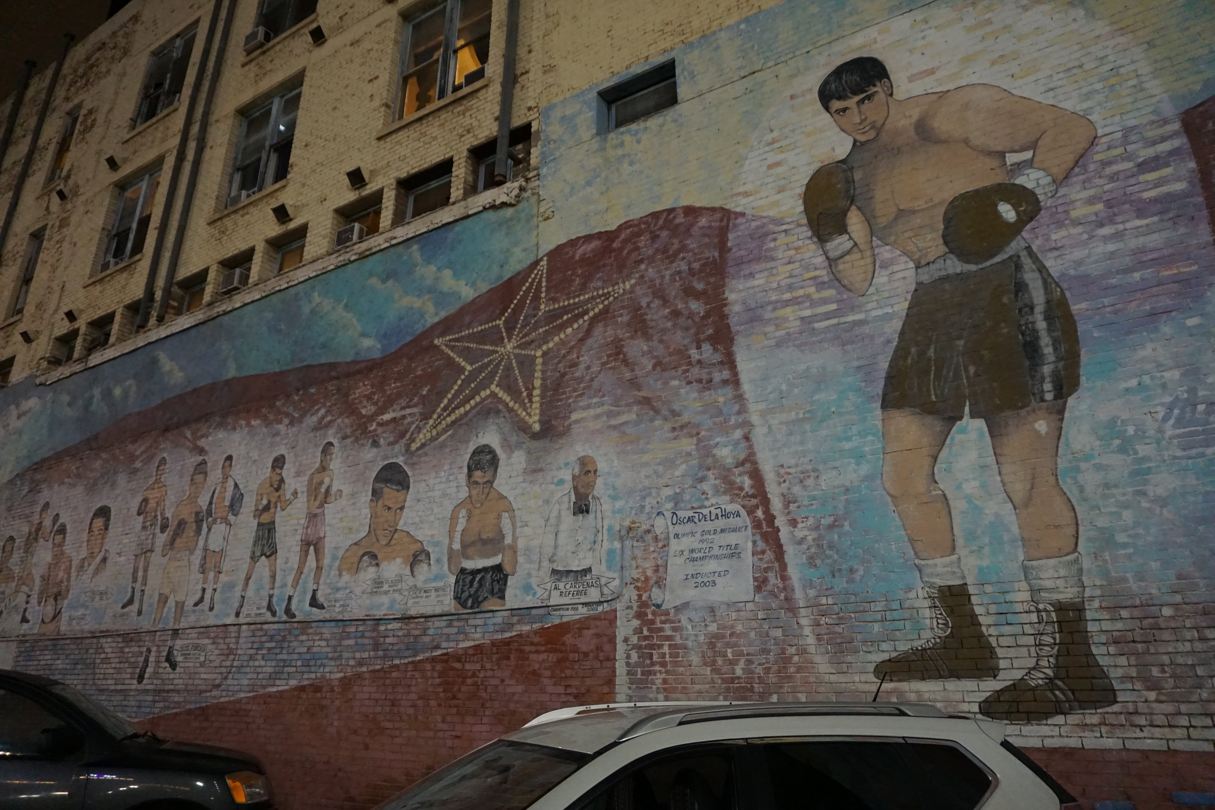 Street art mural showing boxer Oscar de la Hoya