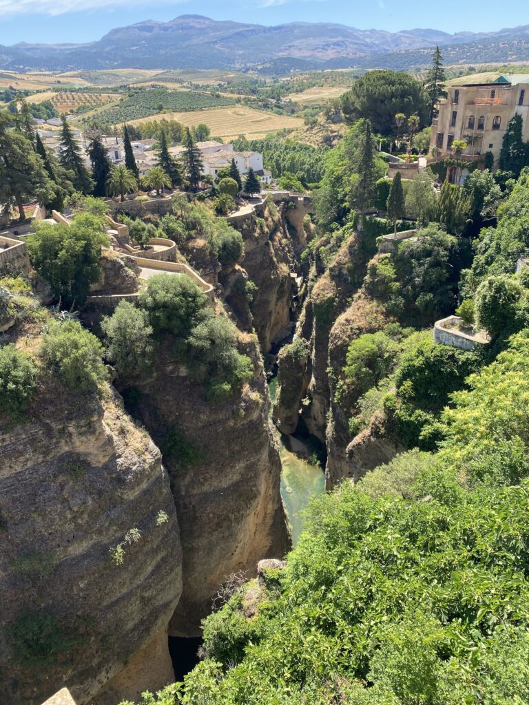 Large gorge with river at the bottom in Ronda, Spain