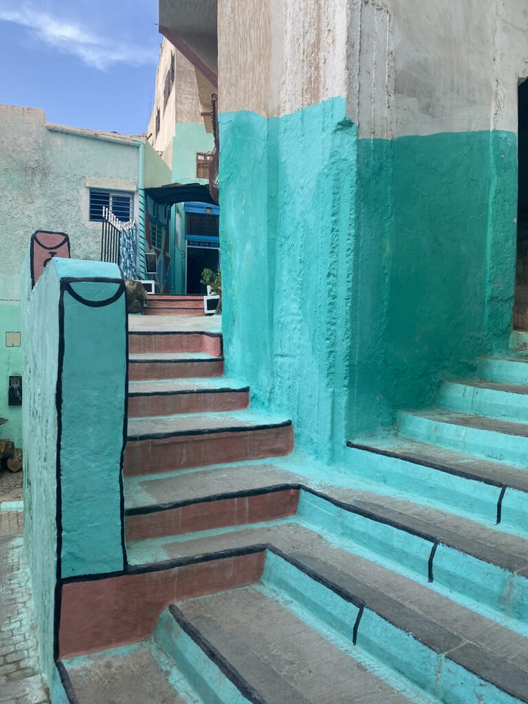 Turquoise painted walls and steps in the town of Moulay Idriss Morocco
