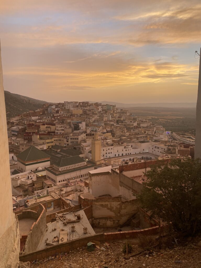 View of Morocco town on a hill during sunset