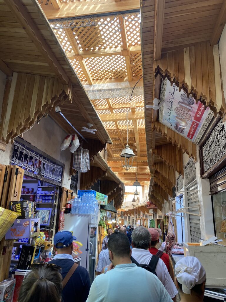 Covered street of wood carvings in Fez Morocco medina