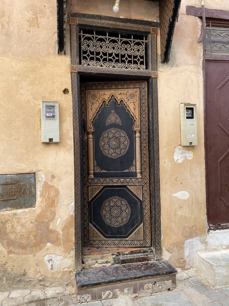 Wooden door of a family home in the Meknes Morocco medina