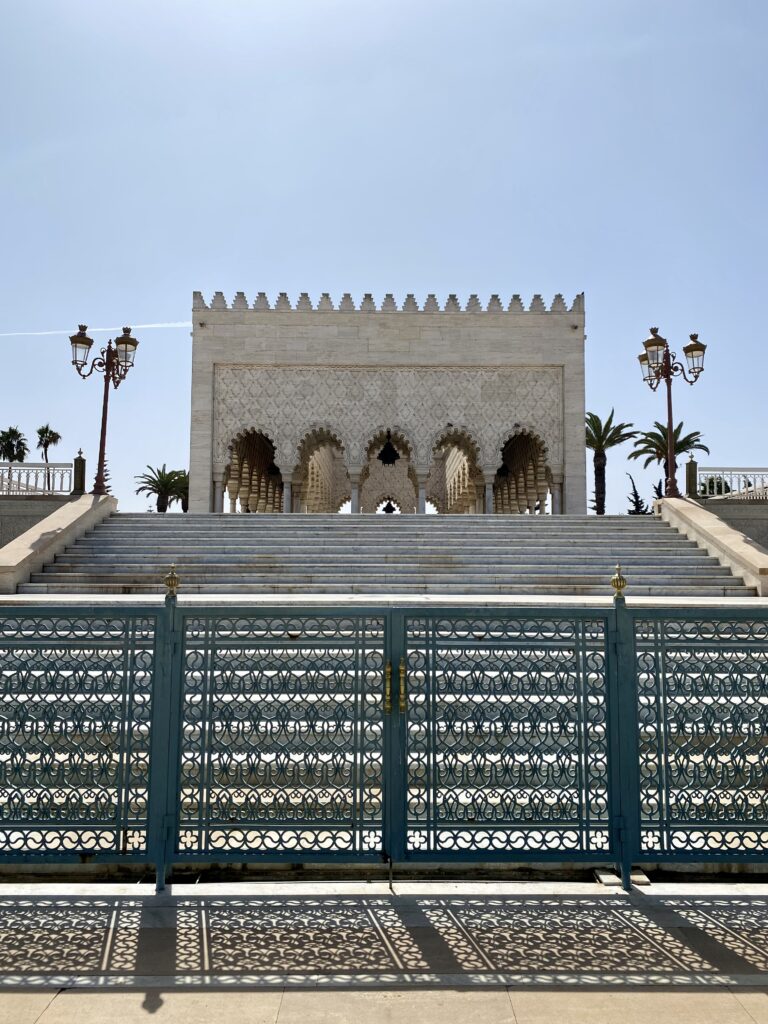 Islamic mausoleum behind an ornate fence in Rabat Morocco