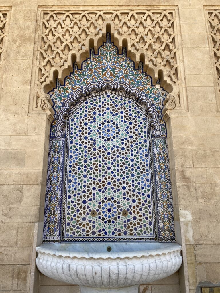Mosaic fountain on the wall of a Rabat Morocco mosque