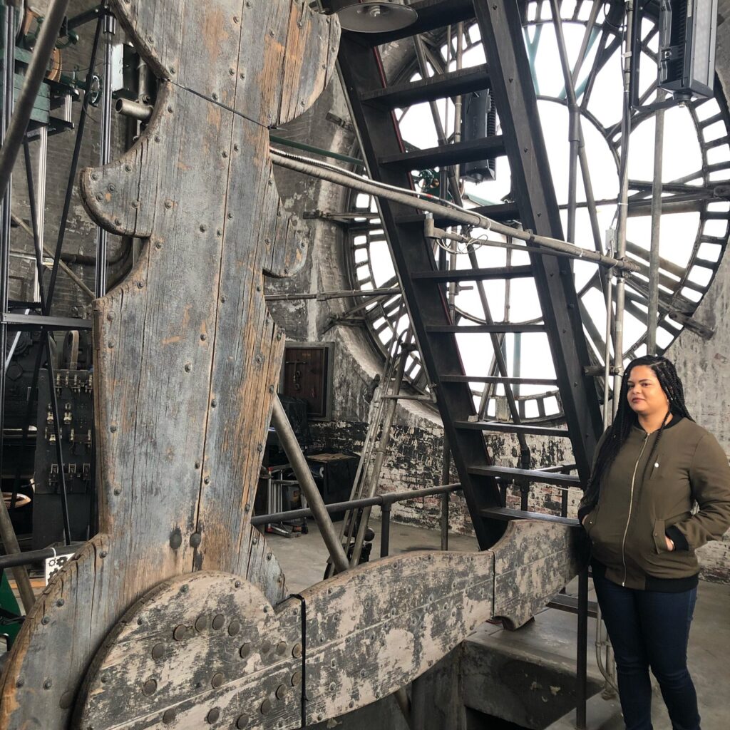 Woman standing inside Baltimore clock tower