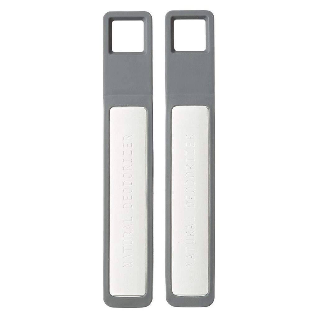 Two gray and white shoe deodorizer strips