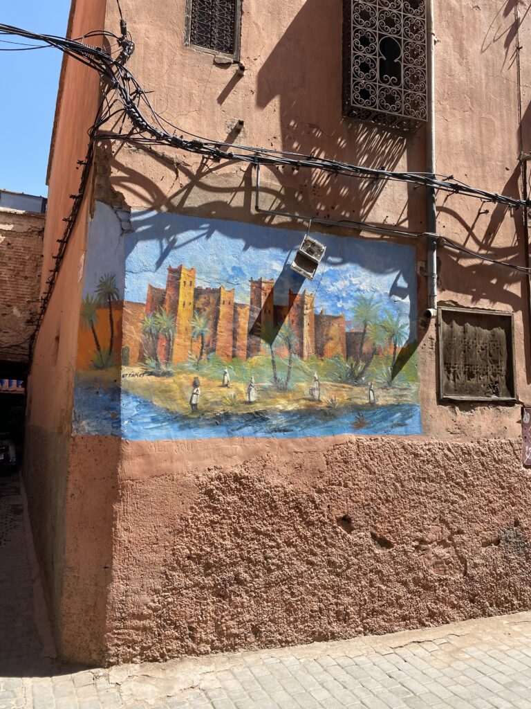Mural on wall of a Marrakesh Morocco medina street