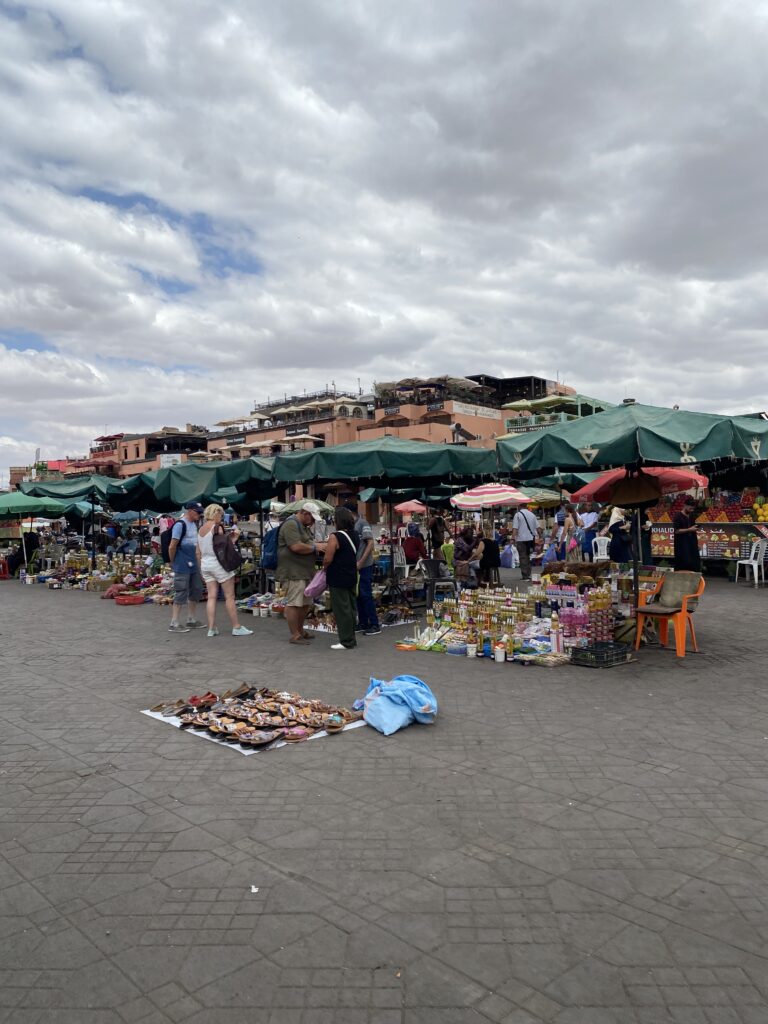 Main square in Marrakesh medina with street vendors