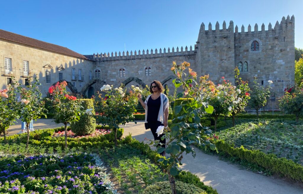 Woman standing in garden in Portugal