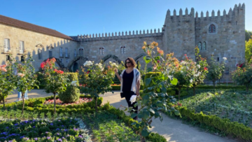 Woman standing in garden in Portugal