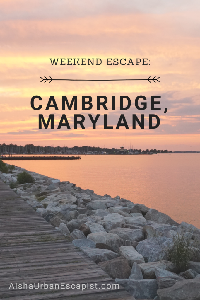 Image of an orange and yellow sunset over water and the text weekend escape in Cambridge Maryland