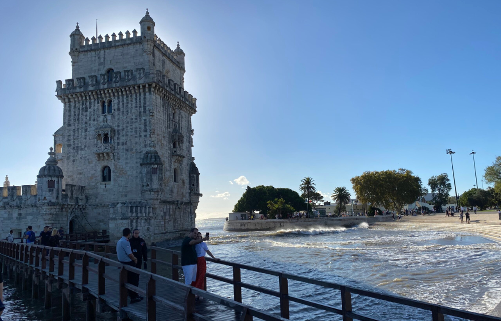 Tower on a Lisbon shore with wooden bridge leading to it