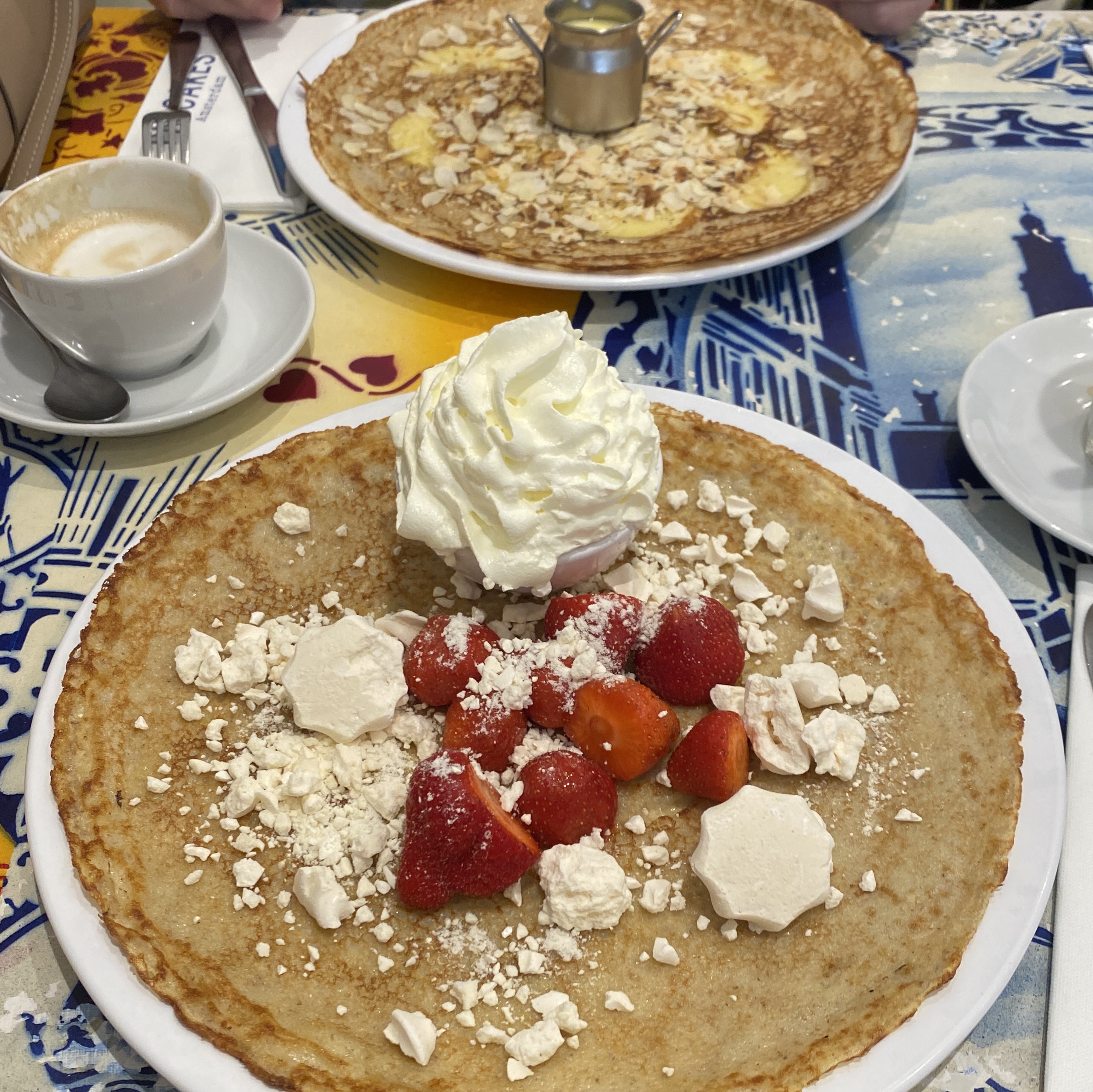 Two plates of Dutch pancakes in an Amsterdam restaurant