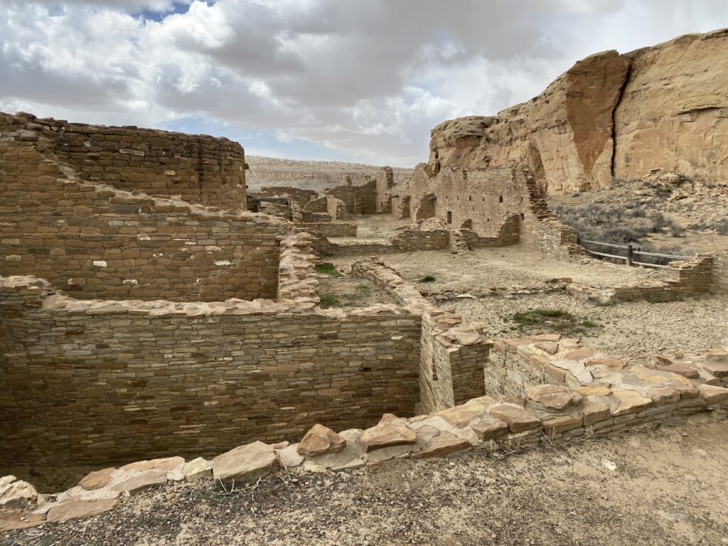 Ancient Native American ruins among desert landscape