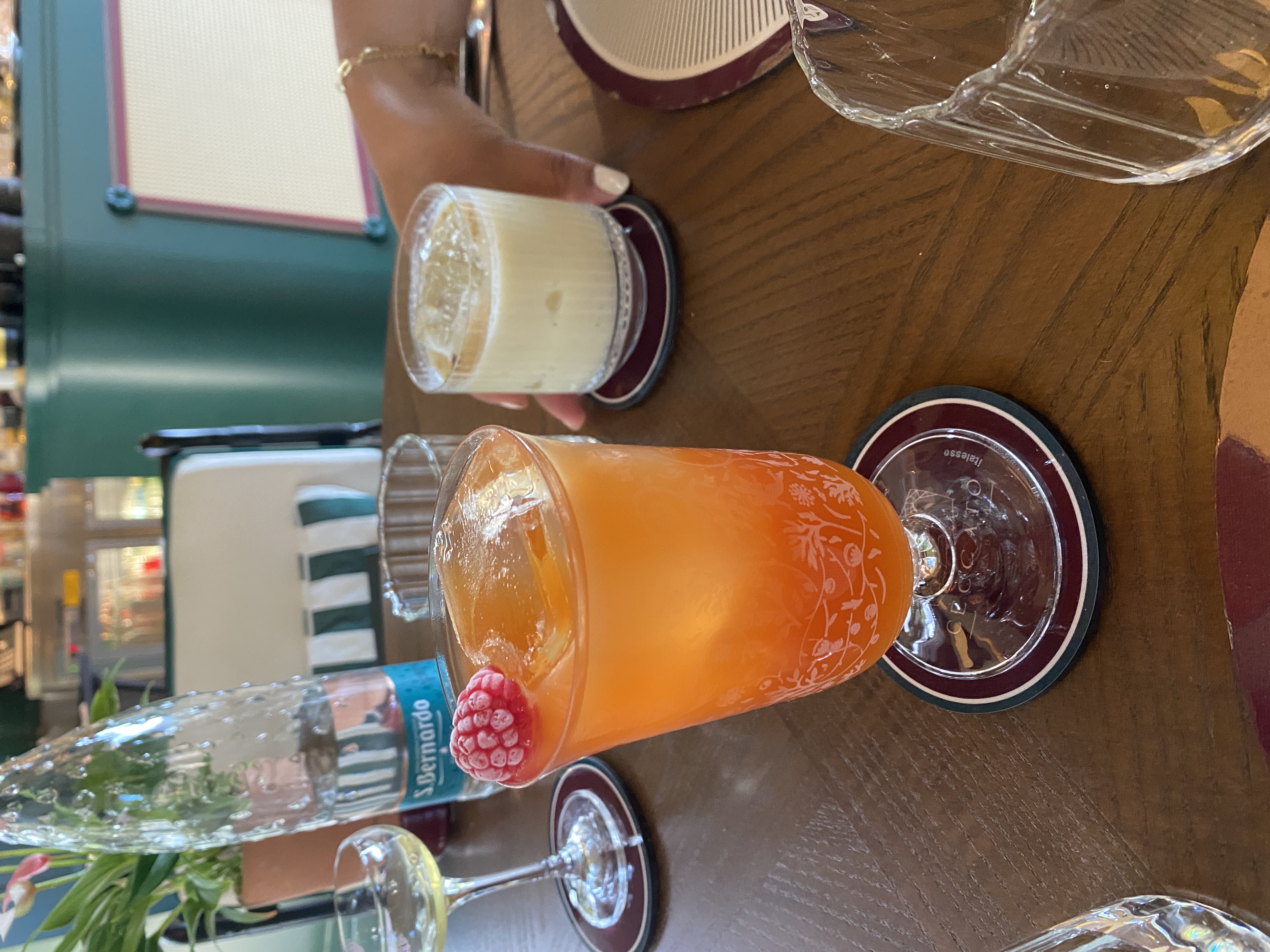 Two cocktails on a restaurant dining table