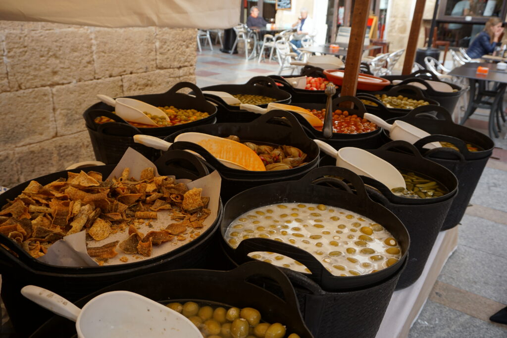 Barrels of marinated olives at a market in the Spanish Mediterranean town of Javea