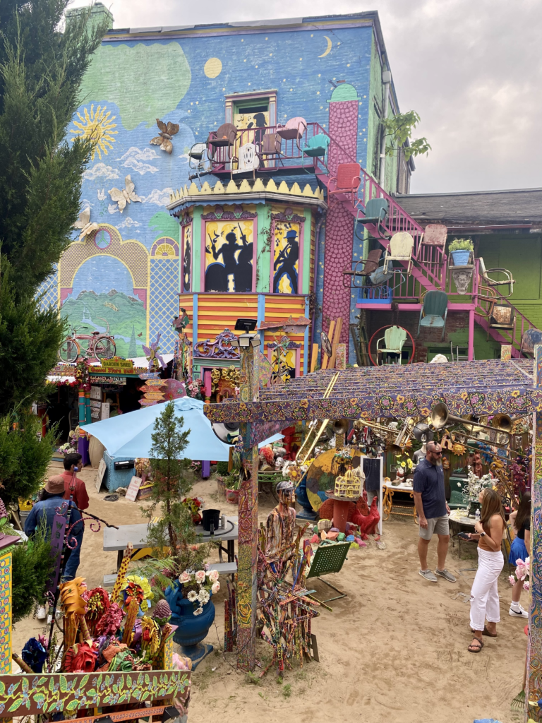 View of colorful and quirky backyard art installation