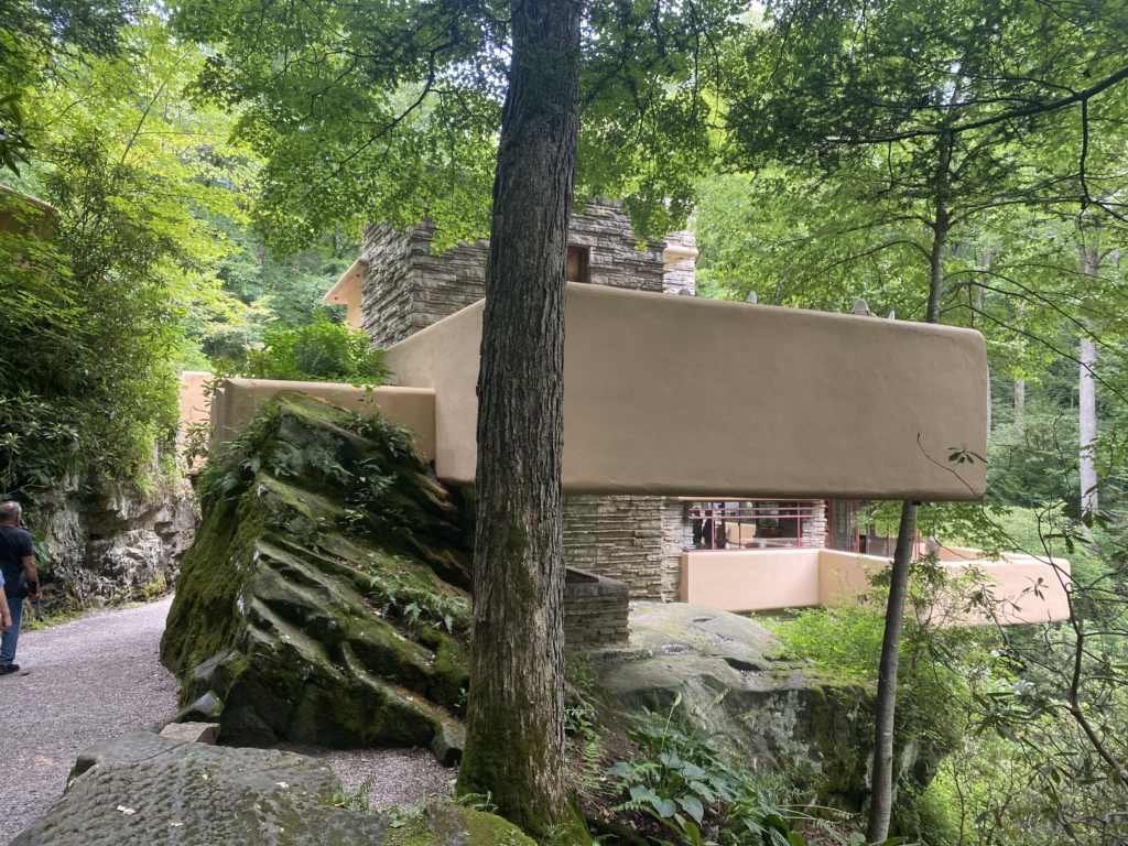 Exterior of architectural house with part of it built into the natural rock